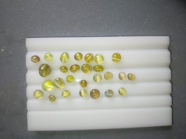 27 Unheated Chrysoberyl Cat's Eye Lot - Cabochon - 20.05 ct - COR authenticated