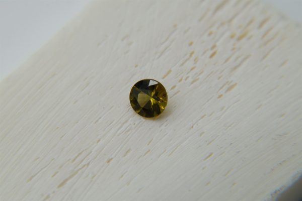 Rare: Vivid Yellow-Green Dunilite - Round - 0.45 ct - COR authenticated